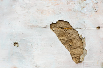 Hole in wall plaster