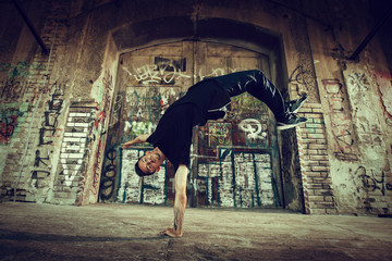 BBoy doing handstand on street