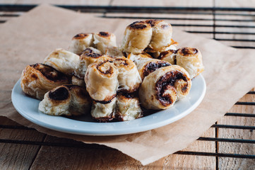 Puff pastry heart cookies on a baking paper