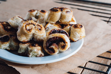 Puff pastry heart cookies on a baking paper