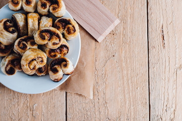 Puff pastry heart cookies on a baking paper