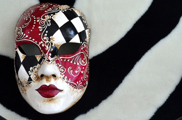 Venetian mask on a black and white background 

