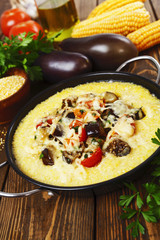 Polenta baked with vegetables and cheese
