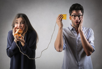 Man and woman trying to communicate