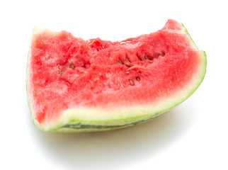 a piece of watermelon on a white background