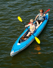 Fototapeta premium Young people in canoes. Family holiday.