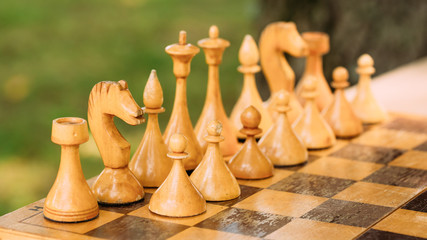 Old Vintage Chess Standing On Chessboard