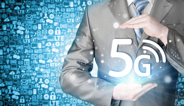 businessman holding in hand 5G, technology background
