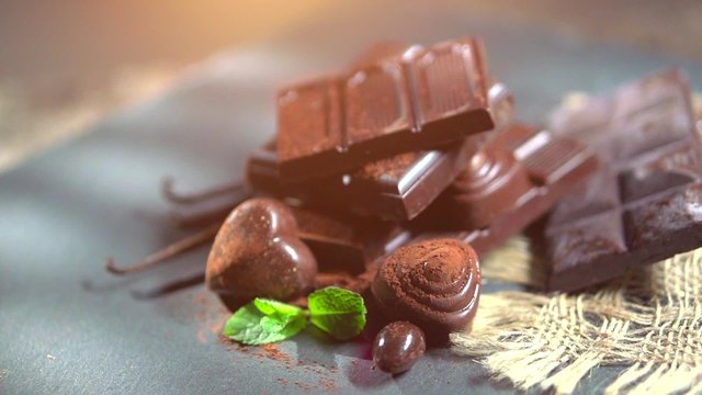 Assortment of fine chocolates rotation 360 background. Dark and milk chocolate