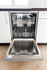 Empty Opened Dishwasher in kitchen (vertical edit)