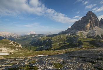 Mountains Panorama of the Dolomites at Sunrise with clouds