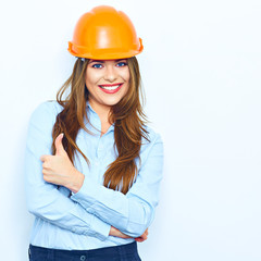 Business woman show thumb up. Woman builder portrait.