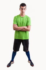 Naklejka premium Full length portrait of a fit young soccer player standing over