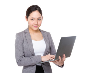 Asian young Businesswoman use of the laptop computer