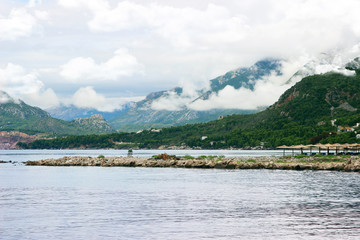Bar, Montenegro. Sea view. Clouds in mountains. City