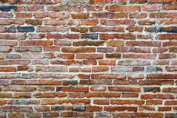 Brown brick wall in an old contemporary temple in Thailand