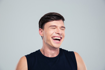 Fototapeta premium Portrait of a laughing man standing