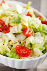 Salad with iceberg and cherry tomatos