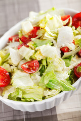 Salad with iceberg and cherry tomatos