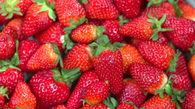 Juicy strawberries rotation 360. Loop food background