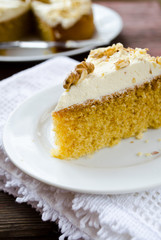 Homemade cake with butter cream and walnuts