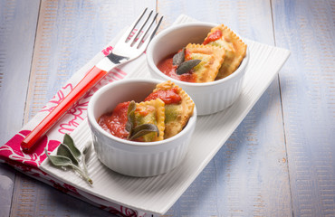 fried ravioli with tomatoes sauce
