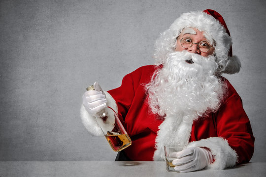 Santa Claus with a bottle of whisky