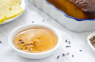 French cake with lavender flowers and lemon glaze