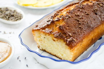 French cake with lavender flowers and lemon glaze