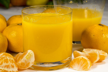 Glass of tangerine orange juice freshly squeezed © Alonso Aguilar