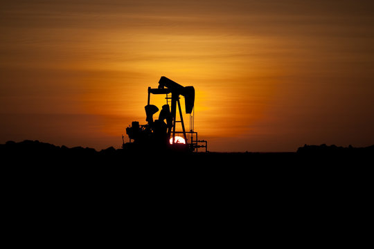 Silhouette of an oil well at sunset, Lobitos, Talara, Peru