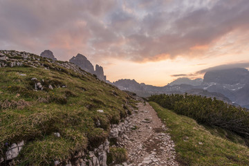 Mountains Panorama of the Dolomites at Sunrise with clouds. Phot