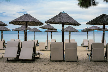 Sunbeds and umbrellas on the beach 