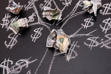 Money tree drawing on blackboard close up