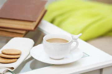 Cup of coffee on table close up