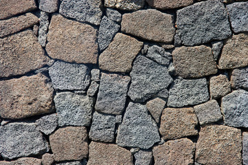 Mur de pierres volcaniques
