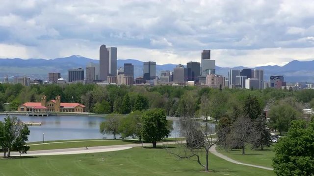 The beautiful downtown skyline of Denver, Colorado, with City Park in the foreground. 4K UHD real-time footage.