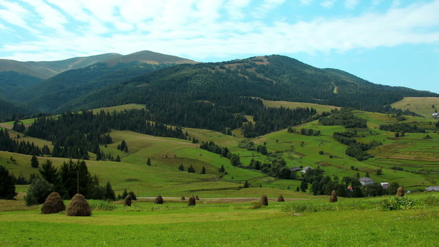 Time lapse of clouds and beautiful green fields