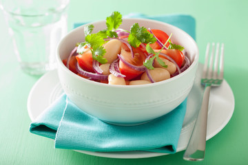 healthy tomato salad with white beans onion cilantro