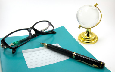 Fototapeta premium Notebooks, pens, glasses