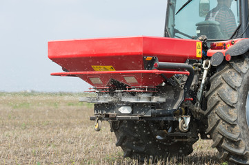 Fototapeta na wymiar Tractor and fertilizer
