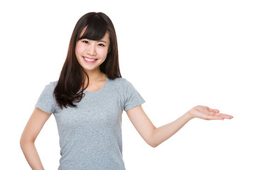 Young Woman with hand showing blank sign