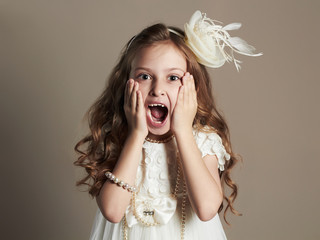 funny little girl in princess dress.screaming child © eugenepartyzan