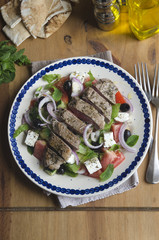 Greek salad with lamb meat