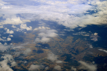 Fototapeta premium felder wolken von flugzeug