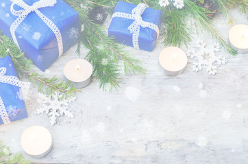 Christmas background with gifts, candels and fir tree