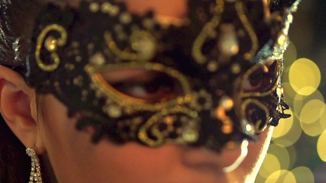 Venetian masquerade. Sexy woman wearing masquerade mask