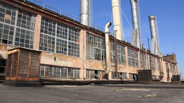 Roof of heat station with chimneys