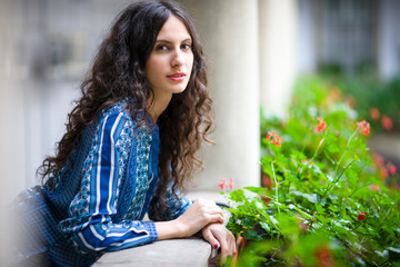 The portrait of young lady in the city