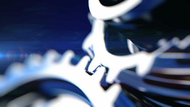 3d animation of rotating gears. Shallow depth of field